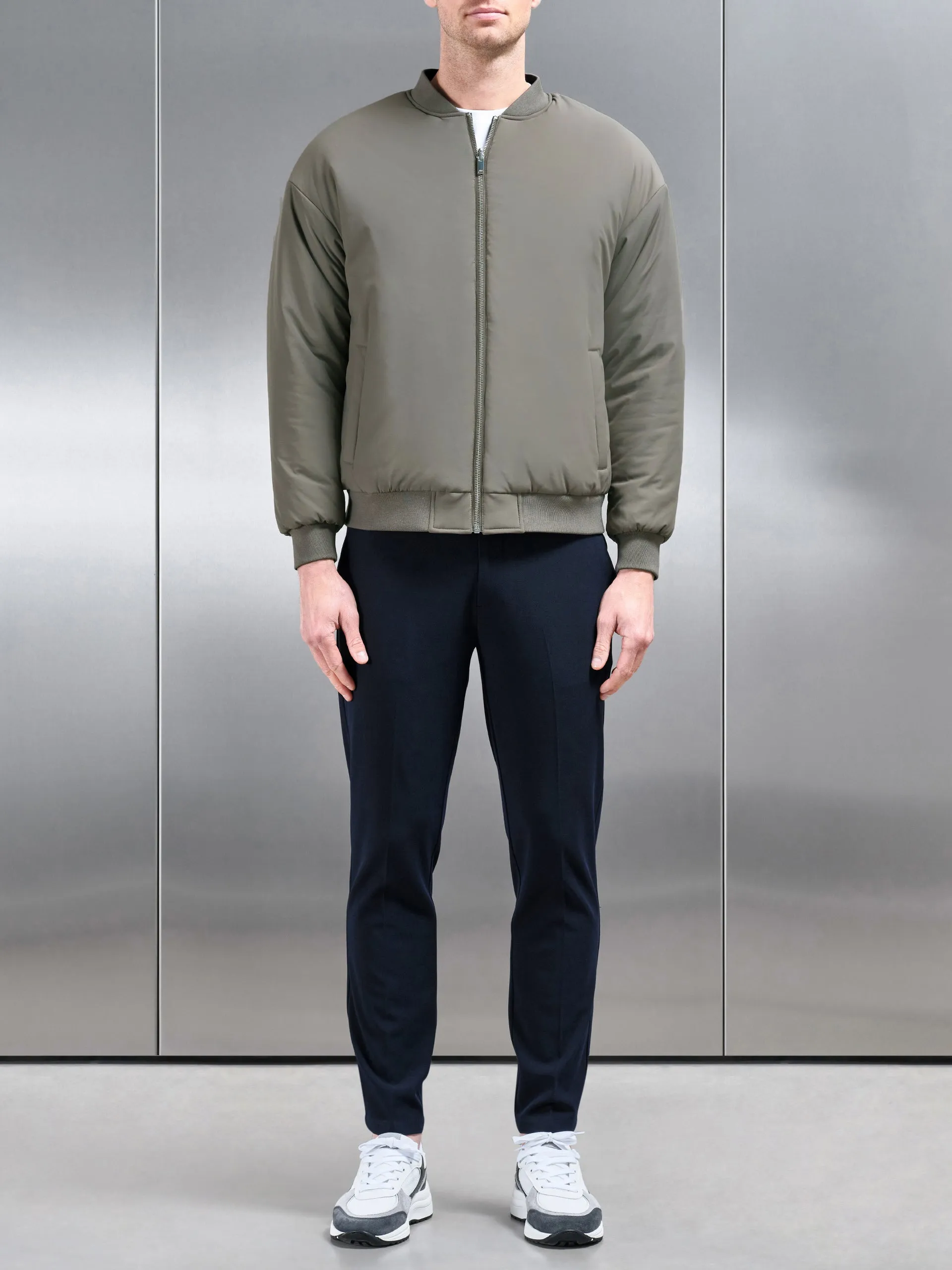 Relaxed Padded Reversible Bomber Jacket in Olive Navy