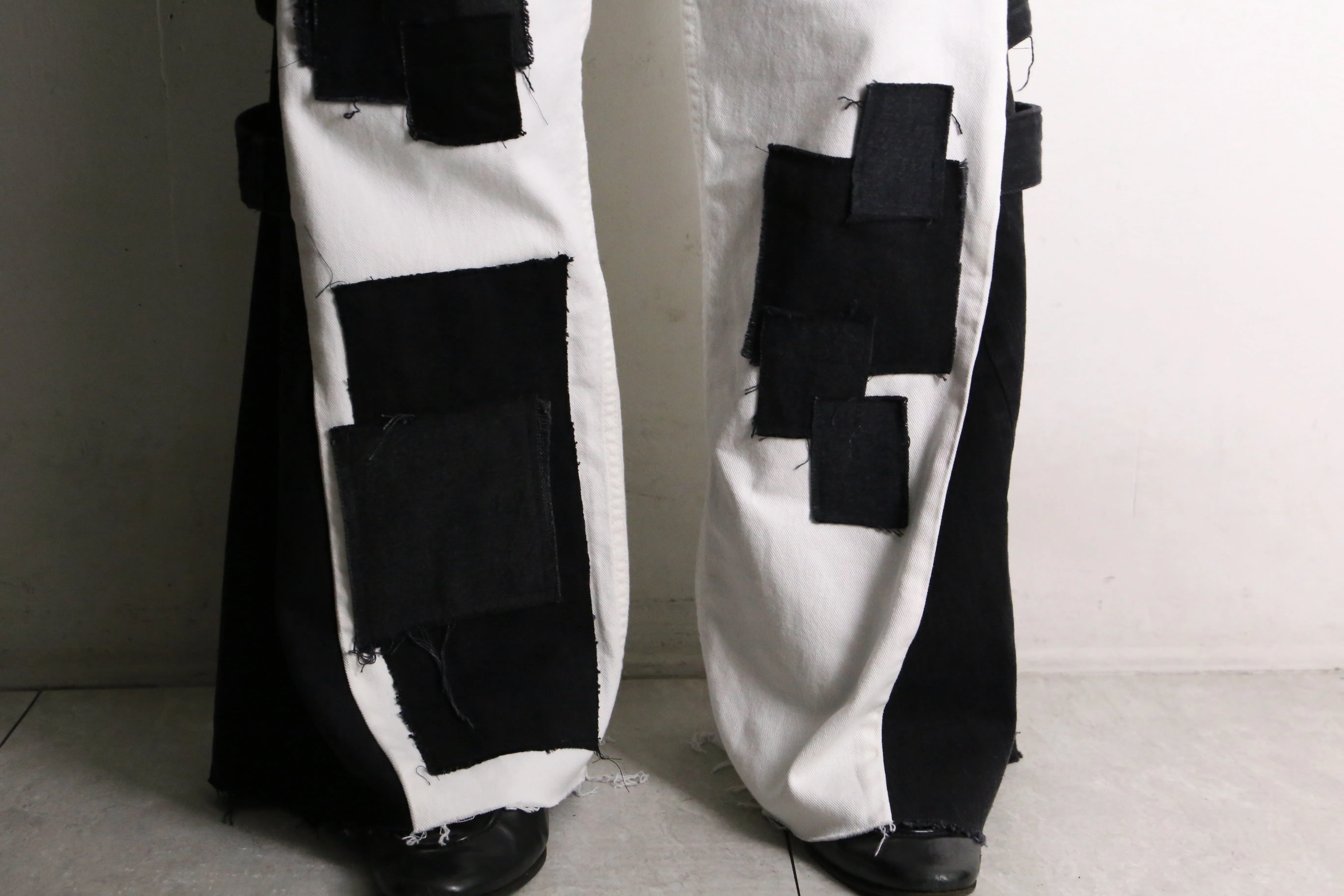 remake "再構築" black×white color patchwork design flare denim pants