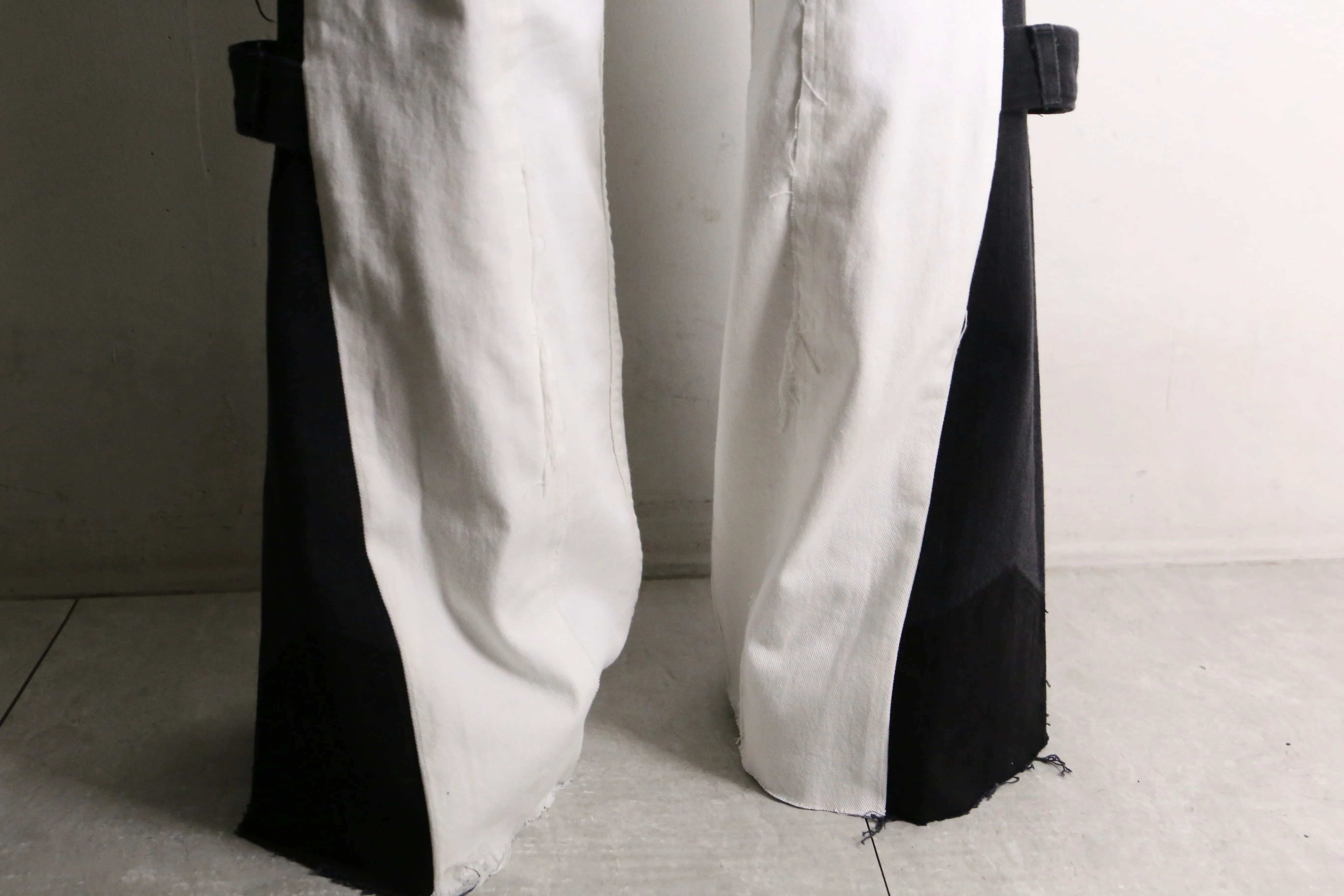 remake "再構築" black×white color patchwork design flare denim pants